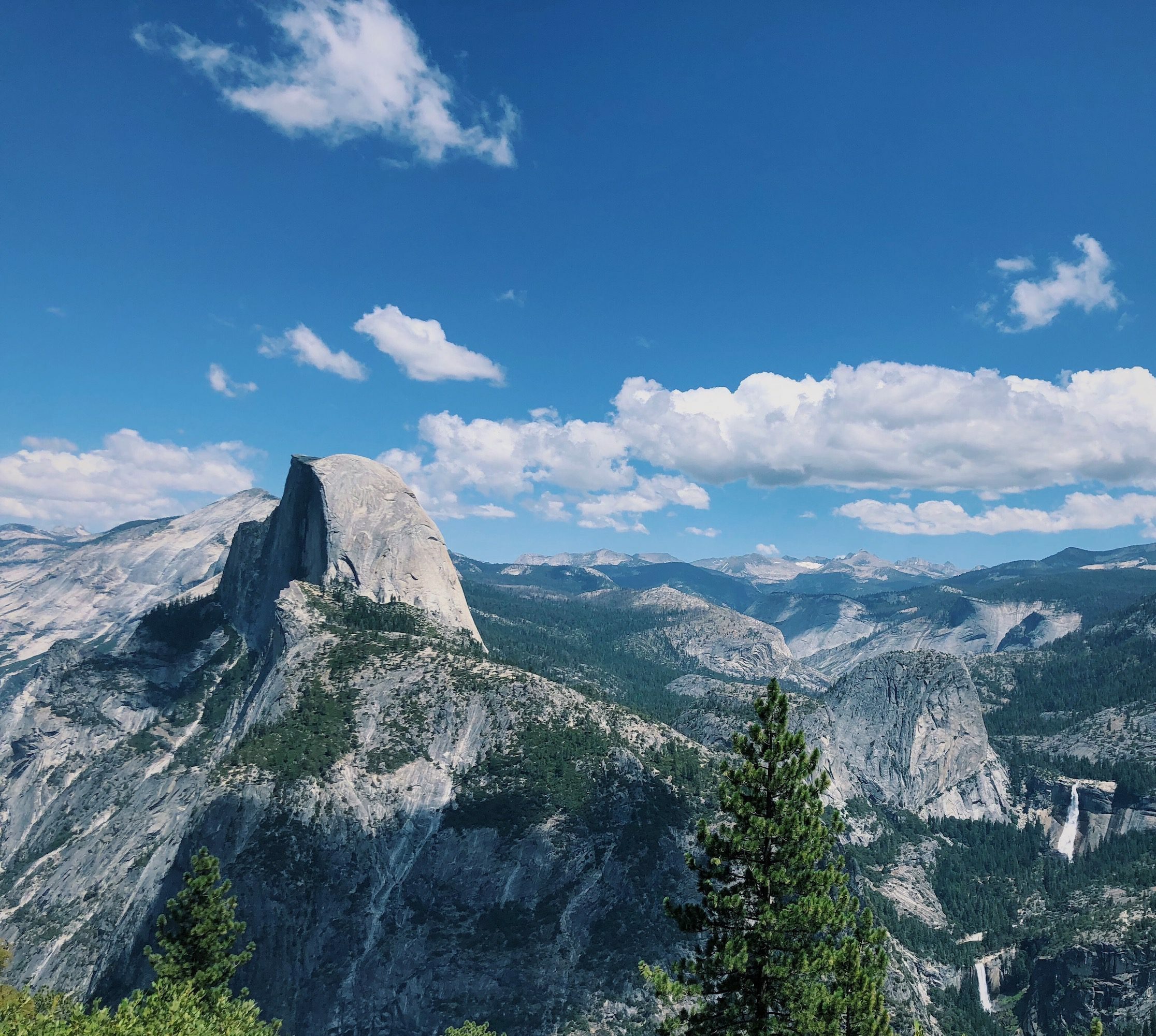 Experience a group camping adventure in Yosemite National Park.