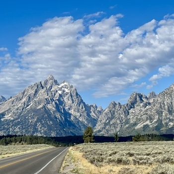 The Grand Tetons beneath the clouds