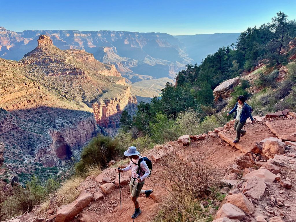 Hikers descend into the Grand Canyon