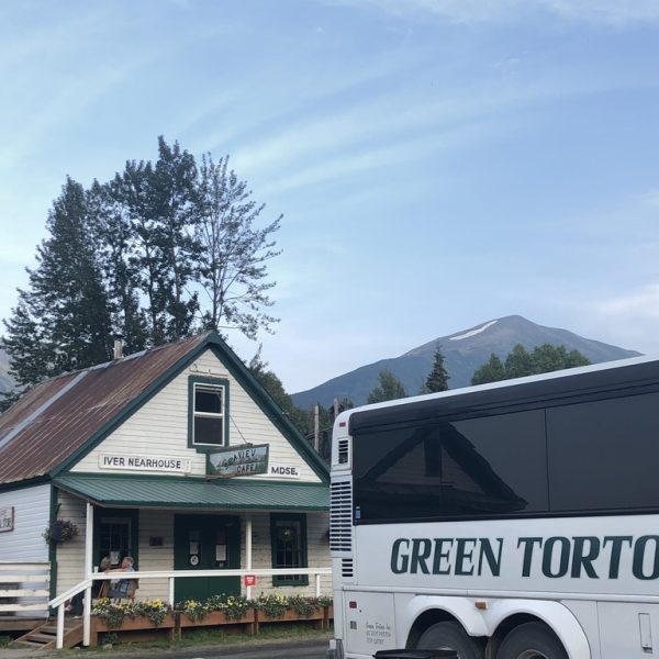 The Green Tortoise bus parked in Hope, Alaska
